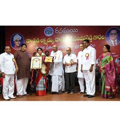 Prathibha Puraskara Award being presented to Smt.Ch.Sailaja Kiron
